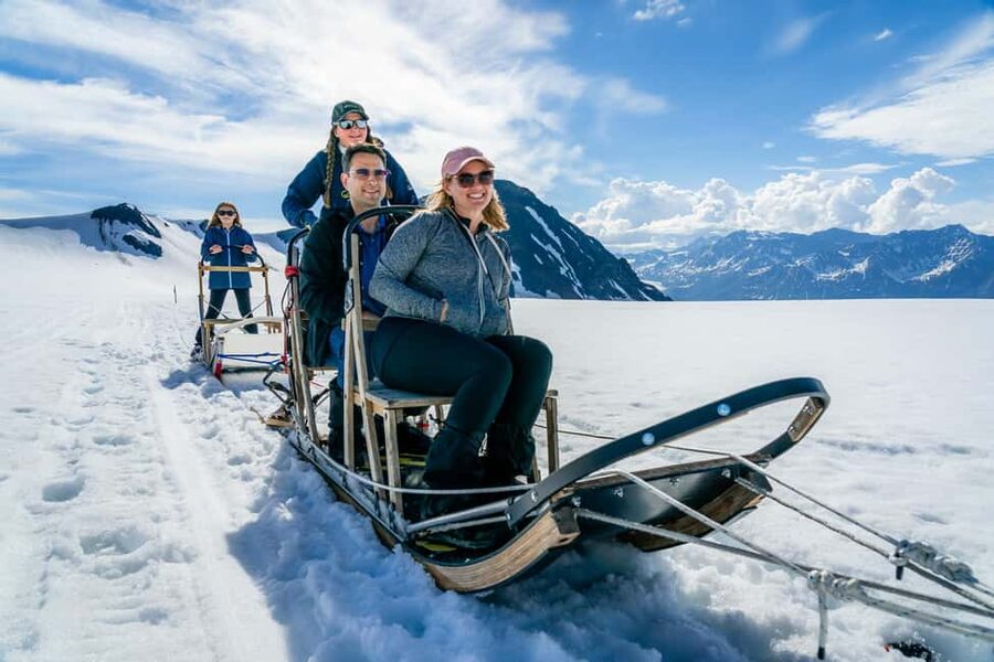 Anchorage Area: Helicopter and Glacier Dogsled Tour - Taking off above the Chugach Range and Knik Glacier
