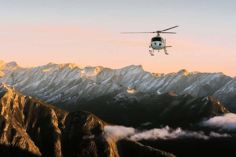 Canadian Rockies: Abraham Lake Ice Bubbles Helicopter Tour - Landslide Lake by snowshoe