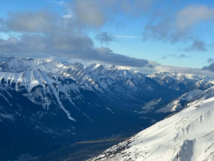 Canmore: 25-Minute Three Sisters Helicopter Tour - Flying over the Bow River toward the Three Sisters