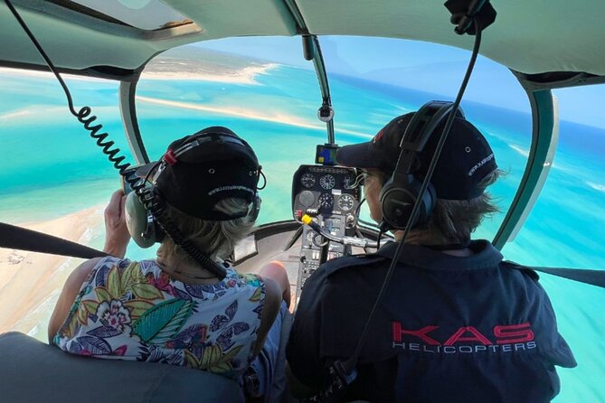 Colours of Broome: Stunning 30-Minute Scenic Helicopter Flight - Red cliffs and turquoise water at Gantheaume Point