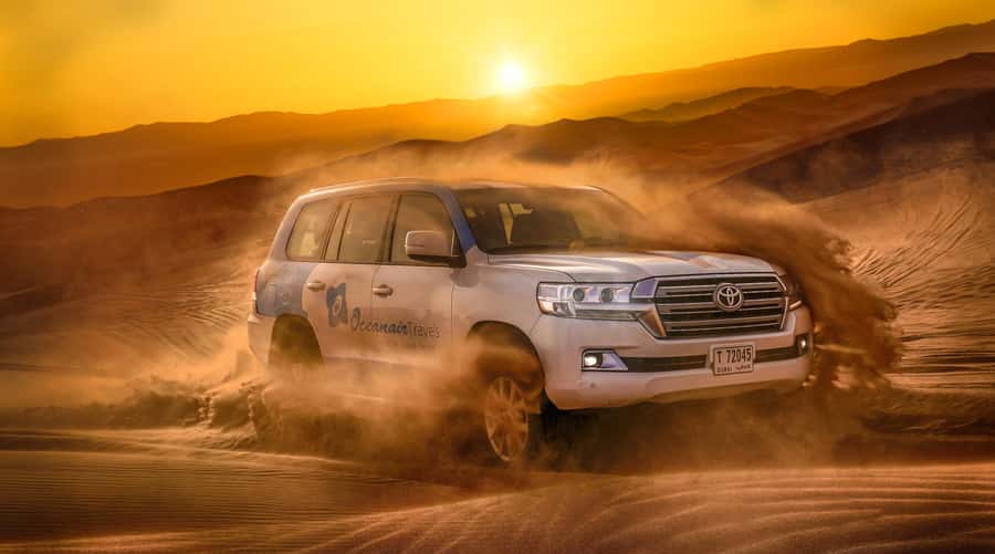 Dubai: Helicopter Ride, Desert Safari, Camels & Refreshments - Optional quad biking across the red dunes