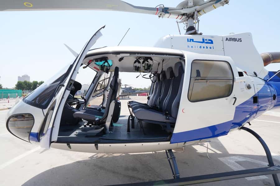 Dubai: Helicopter Ride, Old Town Walking Tour, Abra & Snacks - Practical limits and who should book