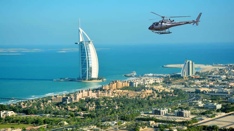 Dubai: Helicopter Ride, Old Town Walking Tour, Abra & Snacks - From the helipad to Al Khayma Heritage Restaurant