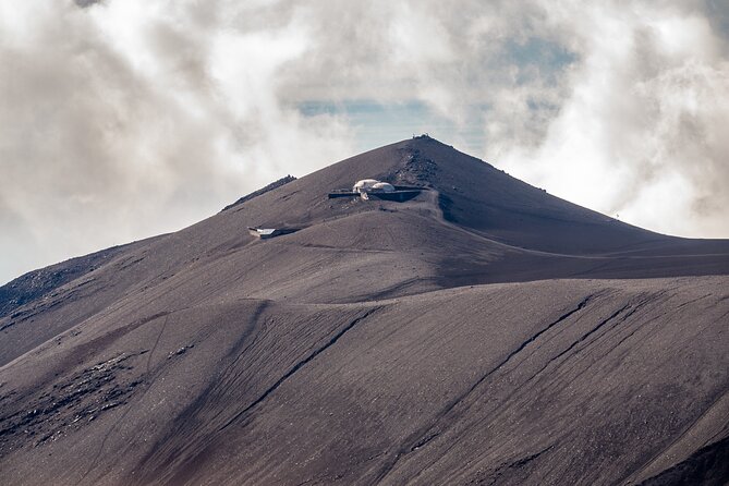 Etna : Group Helicopter Flight (including round trip car transfer) - The horseshoe-shaped cavity and the lava fields