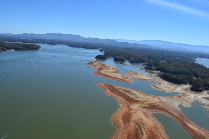 Extended Douglas Lake Region Tour by Helicopter - Climbing toward 1,000 feet above Douglas Lake