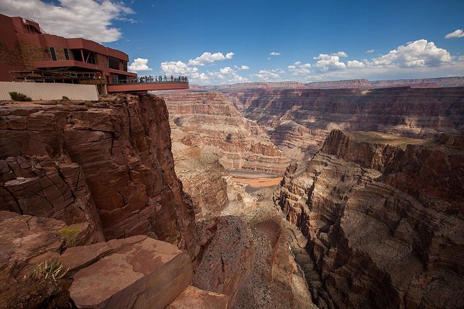 Grand Canyon Helicopter and Western Ranch Adventure Landing Tour - Flying below the Grand Canyon’s West Rim
