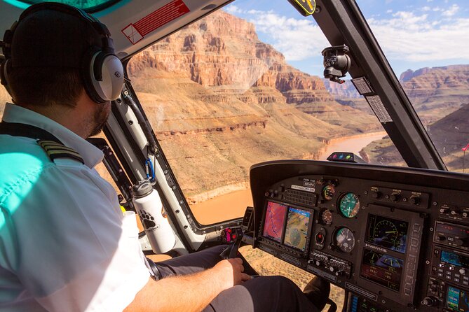 Grand Canyon West Rim by Coach with Helicopter Tour and Meals - Guano Point and lunch with a clock running