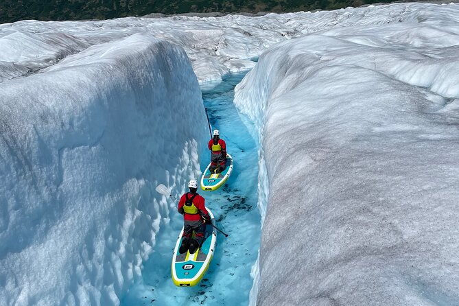 Helicopter and Glacier Paddle Boarding -PRIVATE - A helicopter flight into Alaska’s high country