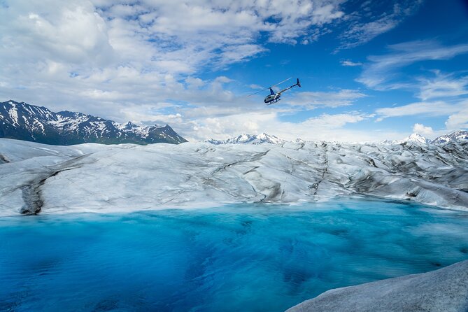 Helicopter and Glacier Paddle Boarding -PRIVATE - Getting ready at Alaska Glacier Lodge