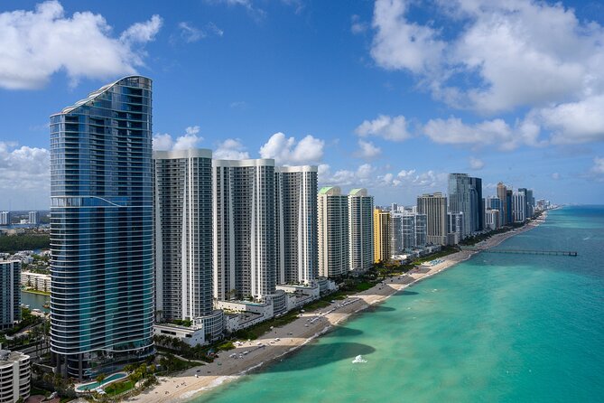 Helicopter Tour- Hard Rock Guitar, Miami & Gold Coast Tour - Hollywood Beach and Sunny Isles stretch the view south