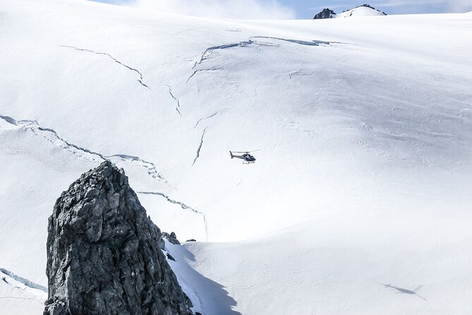 Helicopter Tour Including Glacier Landing from Queenstown - Stepping onto the ice and hearing the silence