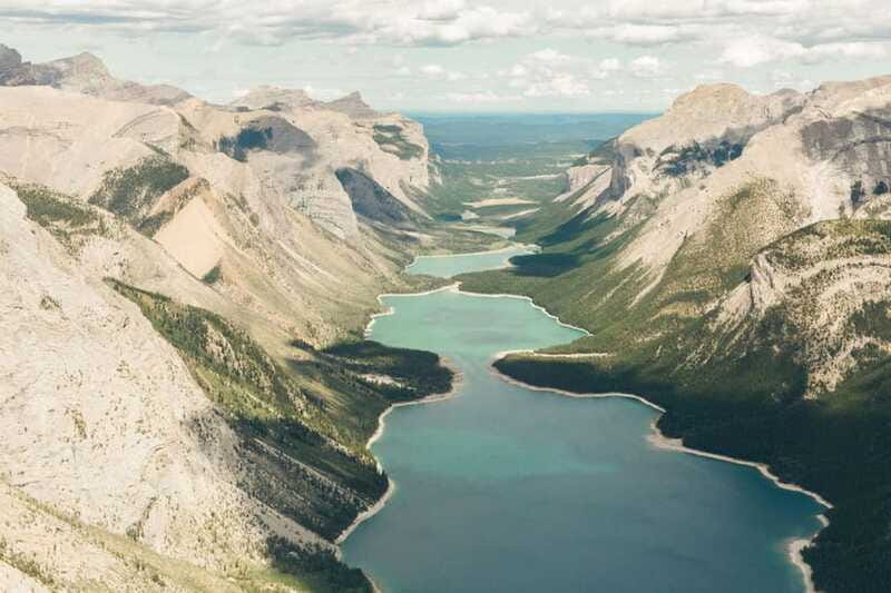 Kananaskis: 30-Minute Heli Tour of Minnewanka Lake and Banff - Between Mount Peechee and Saddle Peak