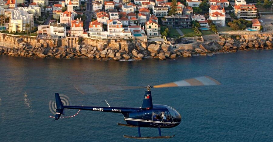 Lisbon: Cabo da Roca and Sintra Helicopter Tour - Pena Palace from a very different angle