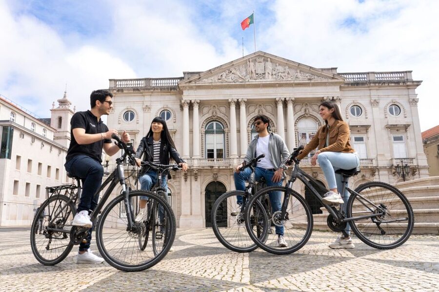 Lisbon: Guided Bike Tour, Helicopter Flight, and Boat Trip - A 10-minute helicopter flight over Lisbon