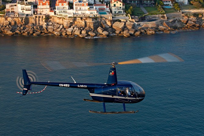 Lisbon: Helicopter Tour over Cascais & Cabo da Roca - Taking off from Algés beside the Tagus