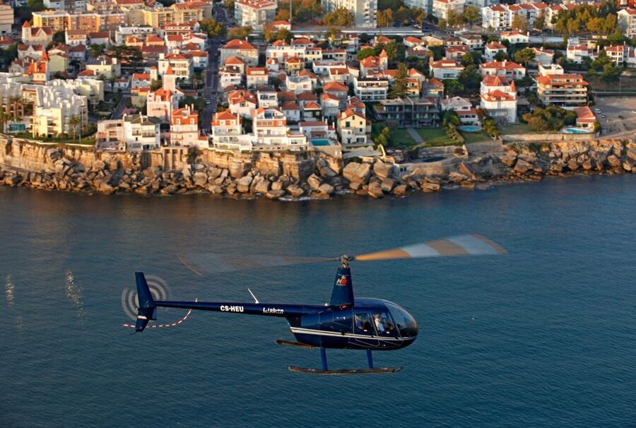 Lisbon: Sightseeing Helicopter Tour Over Belem and Caparica - Crossing the 25 de Abril Bridge