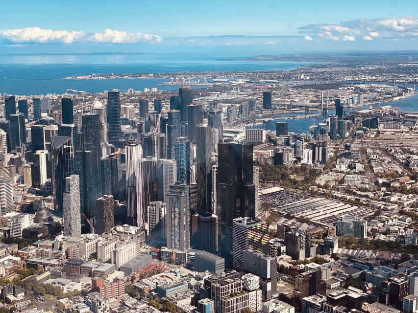 Melbourne: Private City Skyline and Bay Helicopter Ride - The MCG, the Yarra River, and central Melbourne from above