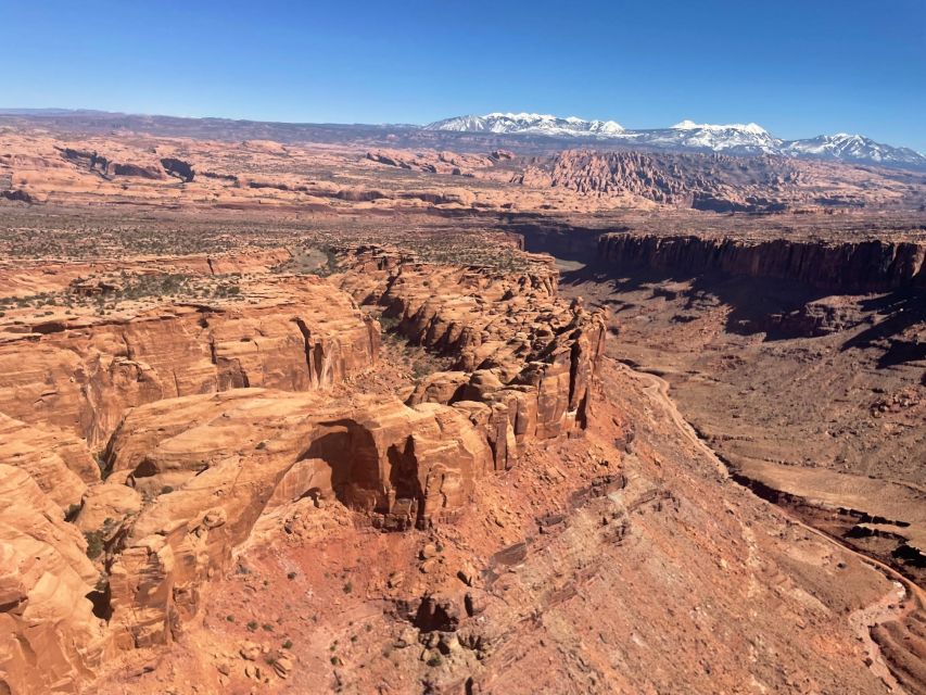 Moab: Canyon Country Sunset Helicopter Tour - From Canyonlands Field into the red rock country