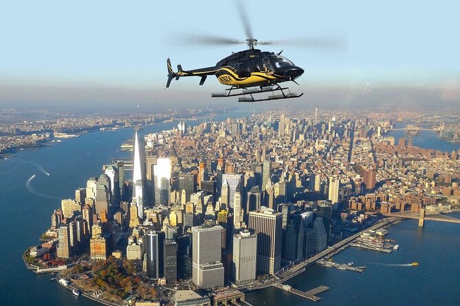 New York City Helicopter Tour at Night - The Statue of Liberty and Ellis Island from the Air