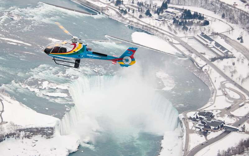Niagara Falls: Private Half-Day Tour with Boat & Helicopter - The helicopter view over both falls