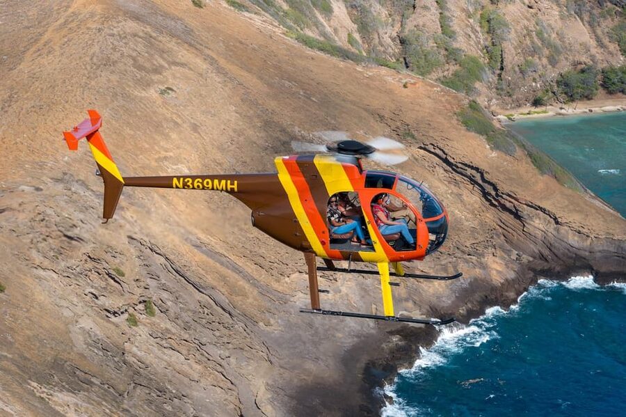 Oahu: Magnum P.I. Doors-Off Helicopter Tour - Boarding the four-passenger Hughes 500D
