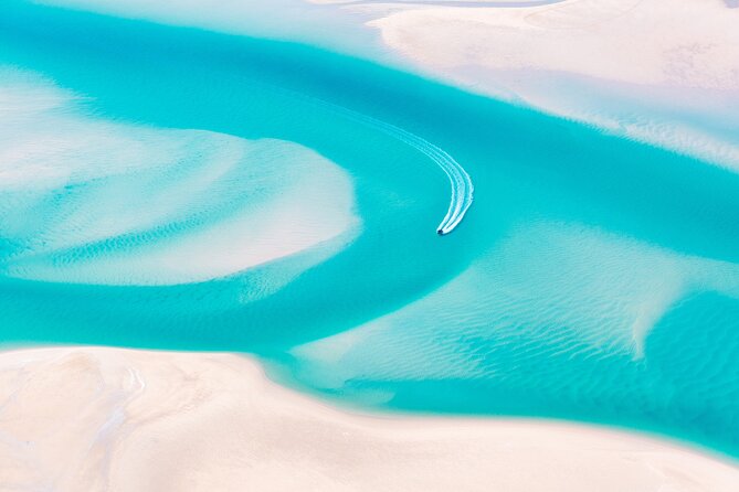 Pearls & Coast: 35-Minute Helicopter Flight & Willie Creek Tour - Cruising the tidal waters by boat