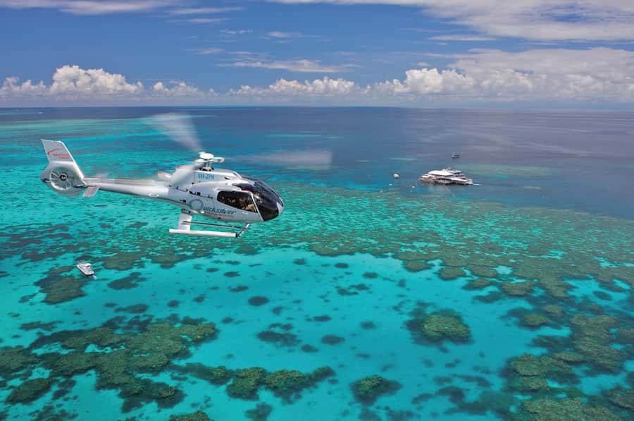 Port Douglas: Outer Barrier Reef Cruise & 10 Min Helicopter - Snorkeling in the protected lagoon