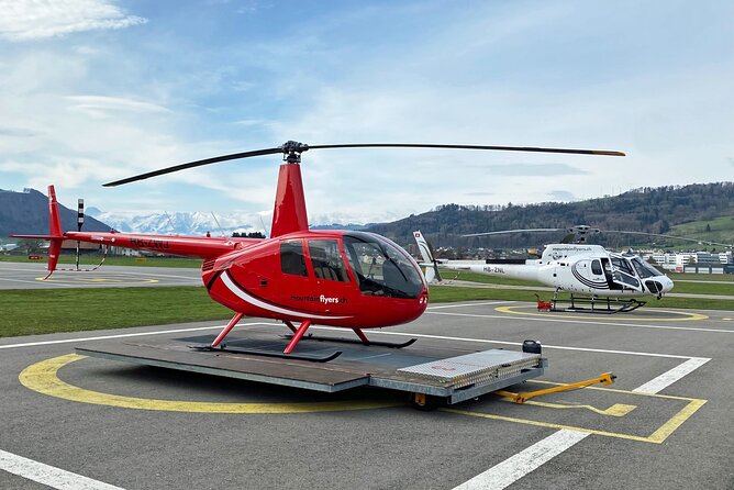 Private Swiss Alps helicopter tour over snow covered mountain peaks and glaciers - Passing Schilthorn and its James Bond connection