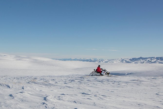 Queenstown Heli-Snowmobiling Adventure - A helicopter start from Queenstown’s Frankton side