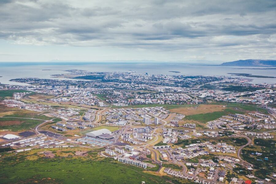 Reykjavik: Panoramic Helicopter Flight with Summit Landing - From rooftops to open country