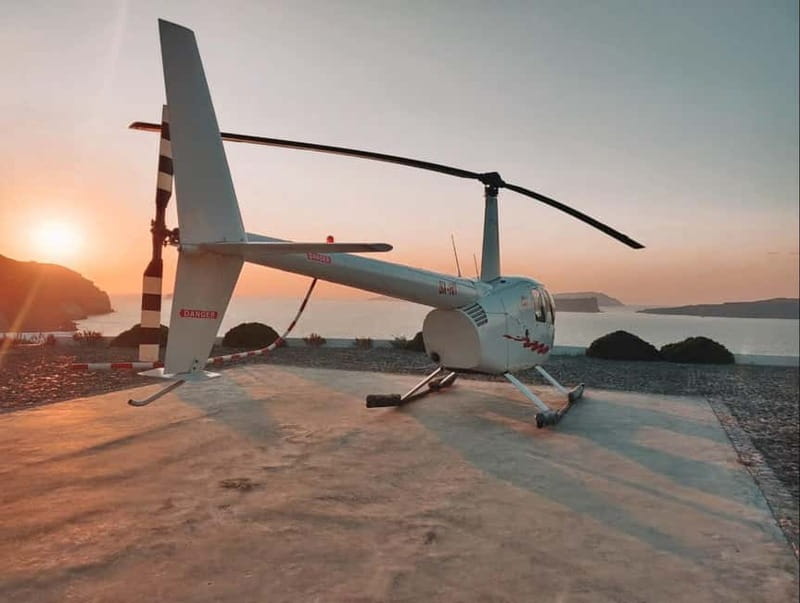 Santorini: Helicopter Sightseeing Flight Over Caldera - Vineyards, dry ground, and the Aegean