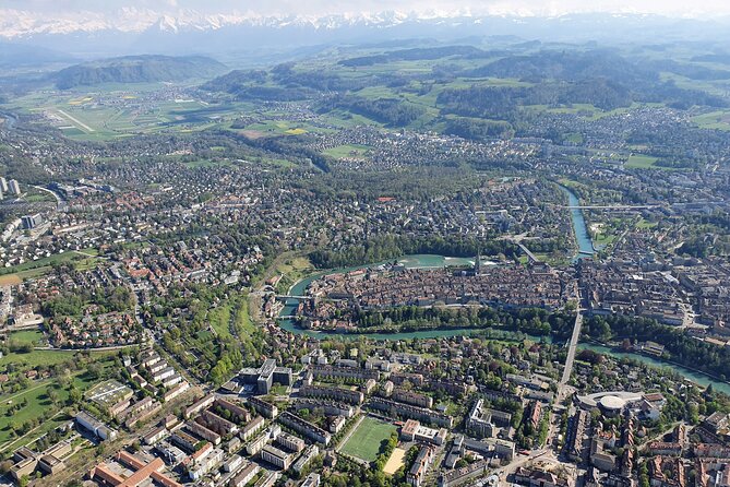 Swiss Capital city helicopter sightseeing tour - the ideal flight to see Berne - Münster, its steeple, and the cathedral park