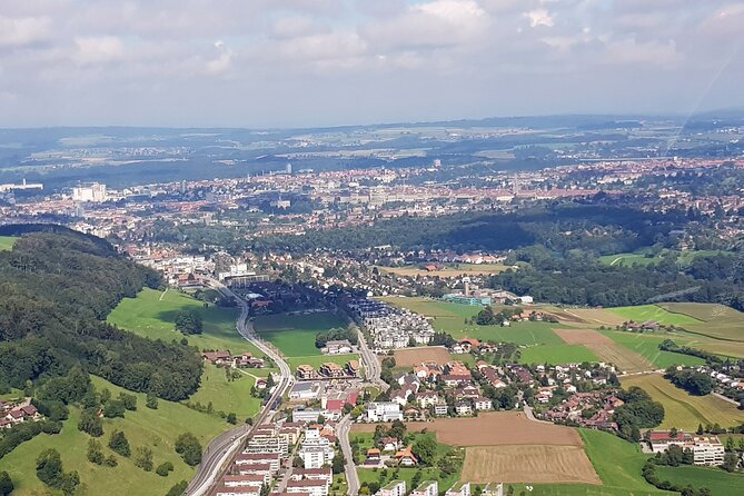 Swiss Capital city helicopter sightseeing tour - the ideal flight to see Berne - Wankdorf Stadium and the big YB mark