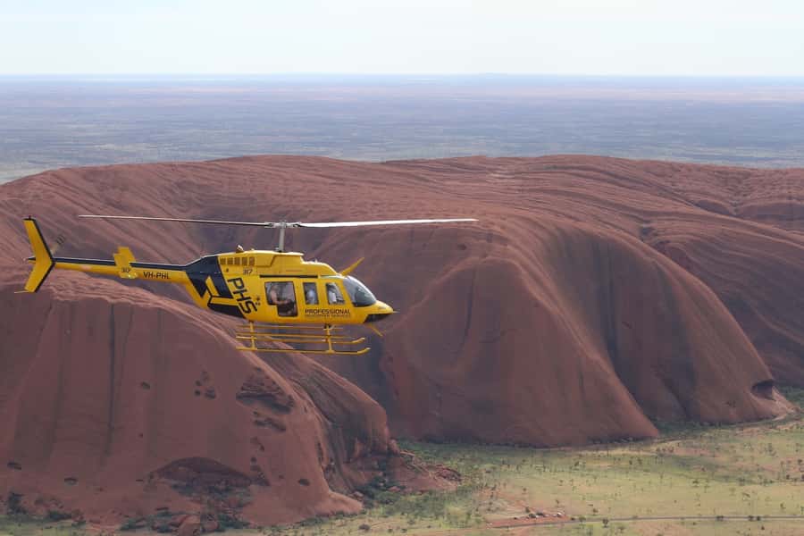 Uluru 15-Minute Helicopter Experience - Seeing Uluru from a helicopter changes its scale