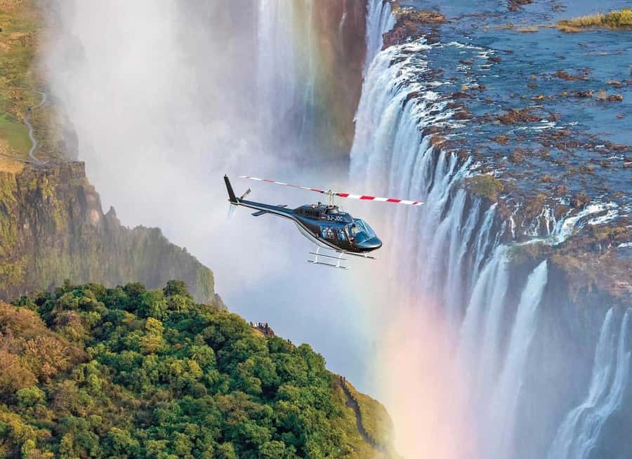 Victoria Falls: Helicopter Flight Aerial View of The Falls - The Takeoff Over the Zambezi River