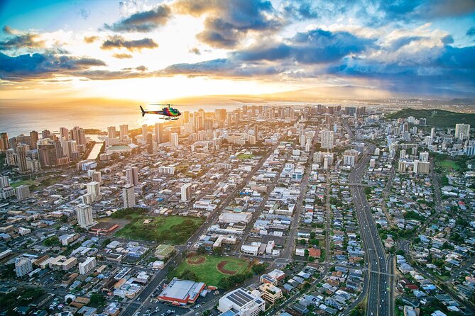 Waikiki Sunset - 50 Min Helicopter Tour - Doors Off or On - Honolulu, Waikiki, and Diamond Head in evening light