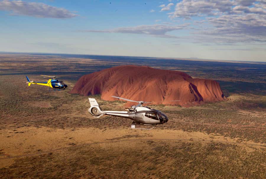 Yulara: Uluru and Kata Tjuta Sunset Helicopter Tour - The pickup from Ayers Rock Resort